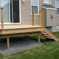 A bench is a perfect deck hand railing idea since it gives a natural place to congregate. Attaching Railing Posts How To Install Deck Railngs