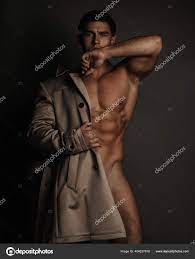 Semi Naked Male Fitness Model Coat Stock Photo by ©sergelee 404237818