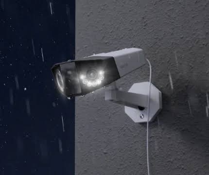 SASITECH technician installing a commercial camera