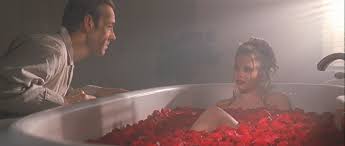 Kevin spacey stars as lester burnham, an advertising executive who has a midlife crisis when he becomes infatuated with his teenage daughter's best friend, played by mena suvari. American Beauty Filmgrab American Beauty American Beauty Poster American Beauty Movie