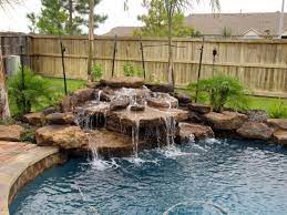 Therefore, in order to build a poolside waterfall, you need to pump water from the main pool up to a smaller, higher pool. These Awesome Stock Tank Pool Ideas Truly Your Bff Next Summer Check It Out You Can Choose The Best Wa Pool Waterfall Backyard Pool Landscaping Backyard Pool