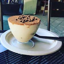 It is made of ladyfingers (savoiardi) dipped in coffee, layered with a whipped mixture of eggs, sugar and mascarpone cheese, flavoured with cocoa. Facebook