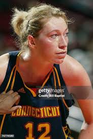 Tamara Moore of the Houston Comets warms up prior to the WNBA game... News  Photo