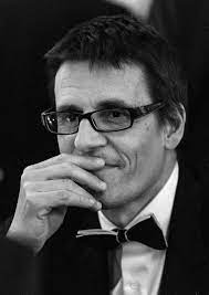The university of cambridge's professor didier queloz has been jointly awarded the 2019 nobel prize in physics for being the first to discover a planet orbiting a star outside our solar system. Didier Queloz Wikipedia