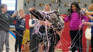 Sra. Lopez's second-graders got to silly string Principal Woller because  they raised the most as a class for the Jefferson Elementary Fitness  Challenge. #WinhawkProud #WhyWAPS