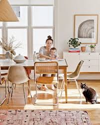 An Organic Modern Dining Room With Mix And Match Vintage Chairs And Minimal Mod Artwork Make The Home O Vintage Dining Chairs Mixed Dining Chairs Dining Chairs
