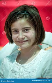 Close-up of Caucasian Girl Smiling Stock Photo