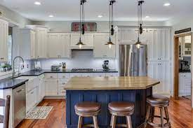 If you're considering a kitchen redesign in the new year, here are some things to consider when it comes to choosing your new kitchen floor. How To Style Your Kitchen Matching Your Countertops Cabinets And Flooring Painterati