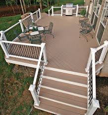 Inset deck lights, on this home, were placed instead on the stairs. First Floor Deck Ideas Fine Homebuilding