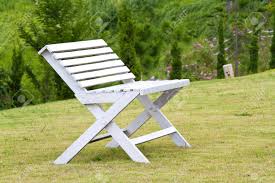 Teak is the preferred wood for outdoor furniture on the beach on account of its ability to withstand all types of weather conditions. A Wooden Lawn Chair Stock Photo Picture And Royalty Free Image Image 15320709