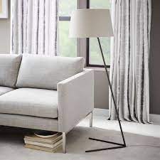 While most floor lamps have straight stems, arc lamps feature a curving arm that can easily reach up and over seating areas, casting their light at a point away from the base. Pin On West Elm Archives
