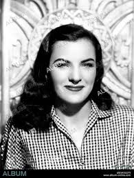 Ella Gets Ella-Vated Into Glamour Role -- Ella Raines, whose natural  beauty, pig-tail charm and "typical outdoor girl" personality have marked  her screen appearances to da