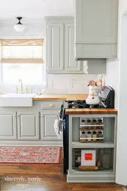 How to make old cabinets look modern? How To Get A Custom Cabinet Look Using Trim Sincerely Marie Designs