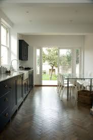 Bath Shaker Kitchen White Walls And Pantry Blue Cabinets Make This Stunning Kitchen Shaker Style Kitchens Shaker Style Kitchen Cabinets Kitchen Cabinet Styles