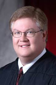 Ex Supreme Court Justice Benjamin 2025