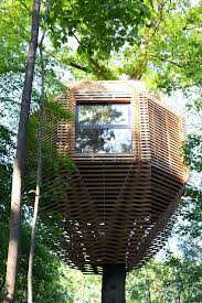 The Origin Tree House Sits Within A Forest In France Beautiful Tree Houses Tree House Designs Tree House