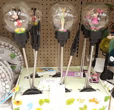 New Disney Garden Decor Spotted At Walgreens Disney Garden Disney Decor Disney Outdoor Decor