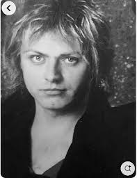 This restored and colorized photo is of Grace Harriet Buck Kopman, sister  to the painter, Claude Buck, and the wife of painter Ben Kopman. It is a  very artistic in its styling,