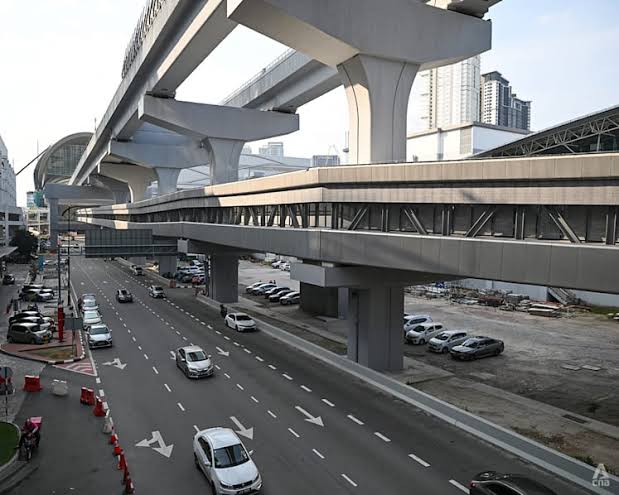 As RTS Link nears opening, Johor Bahru faces test of making its car-dependent centre more walkable; experts cite potholes, blocked crossings, and parked cars