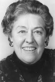 A very young Peggy Devlin with her mother and father Churchill Caledon and  the same Peggy in her 90's at the church grotto outside Caledon a couple of  years ago. She's still