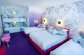 Truth or dare is a good start as well as murder in the dark, charades, or hide and seek. Sleepover Room Towerstimes