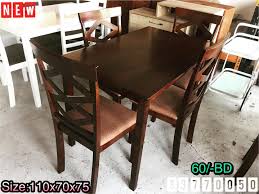 dining table size 70x110x75 wood brown color new made in malaysia price 60 bd طاولة طعام ل 4 أشخاص خشب لون بني dining table home decor furniture
