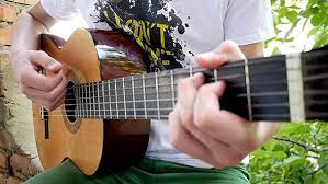 Young Man Playing A Guitar Solo Guitar Solo Guitar Classical Guitar