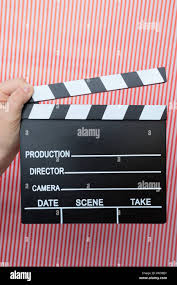 movie marker or clapper board set against a colorfull background, cinema  concept Stock Photo - Alamy