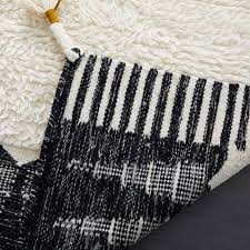 Shag rugs are soft, cozy and luxurious, and come in a variety of textures and lengths. Buy Online Ikat Border Shag Rug Now West Elm Uae