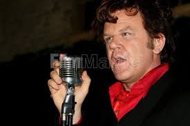 John C Reilly performs as Dewey Cox from the movie Walk Hard at an...