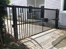 This diy driveway gate plan will show you how to build an automatic gate so you can remain in the safety of your vehicle while opening and closing the the sturdy gates are made from 4×4 lumber and can be covered with lattice, wooden slats, or other building materials to improve curb appeal. Driveway Gates Company Los Angeles Fence Builders