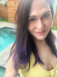 Poolside. It's a rainy day where I am, I'd enjoy being there right now.