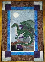 You can stitch multiple cat blocks to assemble an entire quilt, making all of your cats identical or giving each a unique personality. Izzyisms Fantasy Quilt Patterns Dragon Quilt Cat Quilt Patterns Monster Quilt