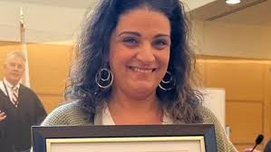 Taunton Recovery Court presents John Munise award to Monica Leonardo.