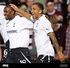 Tottenham Hotspur's Aaron Lennon (right) celebrates the fifth goal during  the UEFA Europa League, Play Off, First Leg at Tynecastle Stadium,  Edinburgh Stock Photo
