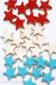 There's no piping or sprinkles involved, just melted chocolate and crushed peppermint candies. 4th Of July Star Cookies Easy Decorated Cookie Idea