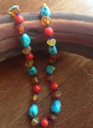 Baltic Amber Turquoise And Red Coral Teething Necklace Baby Toddler By Mamalovetree On Etsy Beaded Necklace Teething Necklace Unique Jewelry