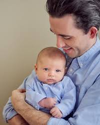 Our newest team member has his blue oxford pressed and ready to go! 👶🏻📸  Is Ted, Chelsea + Connor too long for our photo credit? 😉