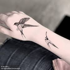 Female Bird Tattoo On Hand Flying Swallow Couple In 2020 Bird Tattoos For Women Hand Tattoos Swallow Tattoo