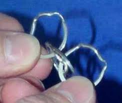 They'll end up like this for the final solution. Puzzle Ring Solution