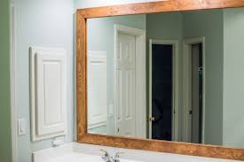 How To Diy Upgrade Your Bathroom Mirror With A Stained Wood Frame Building Our Rez Mirror Frame Diy Bathroom Mirror Bathroom Mirrors Diy