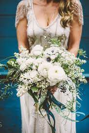 Bridesmads in sparkly blush dresses with lavender bouquets. Seattle Wedding With Vintage Glam Flair Ruffled White Bridal Bouquet Wedding Bouquets Wedding