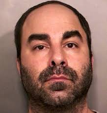 Massapequa Custodian Charged in Assault