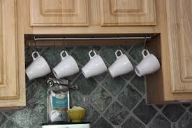 Use A Stainless Steel Rail And S Hooks To Hang Coffee Cups Underneath Your Cabinets Coffee Bar Hanging Mugs Bars For Home