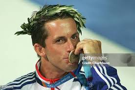 Kevin Burnham and Paul Foerster of USA celebrate winning gold during...  News Photo