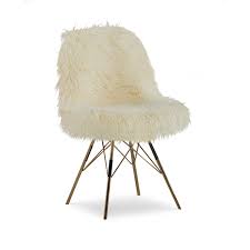 Featuring adorable shag fur, the comfort of a high density foam cushioned seat, this adorable pop of color accent piece can be mixed and matched. Linon Riley Metal Faux Fur Accent Chair In Gold Cymx828