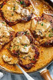 Garlic Pork Chops In Creamy Mushroom Sauce Pork Recipes Pork Dinner Meat Recipes