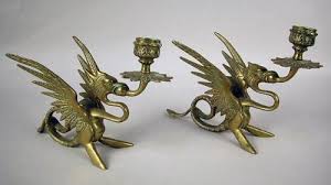Antique brass dragon candle holder. A Pair Of Brass Dragon Form Candlesticks 6 H
