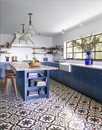 Pure white tiles work well with simple, bright tones of hickory cabinets. How To Style Blue Kitchen Cabinets In 2020 On Roomhints Com