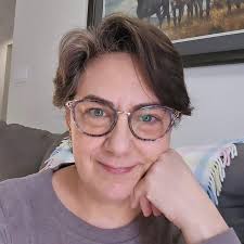 You might as well start with Eccleston's 9th Doctor and the Episode Rose.  They do a pretty good job of rebooting the series and introduce classic  villains as if they are fresh